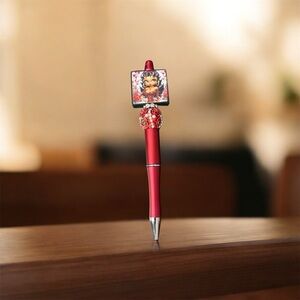 Red Decorative Pen with Character Design